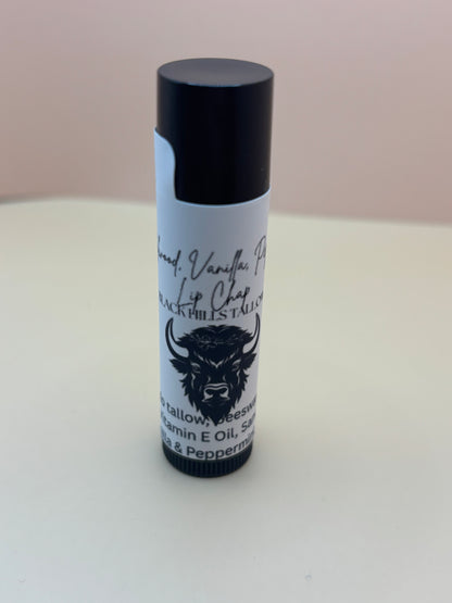 Black and white tube with a logo on a light background
